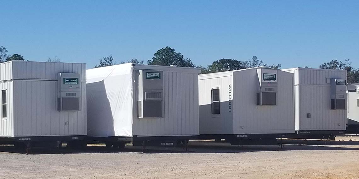 four mobile offices lined up at the WillScot Mobile, AL location